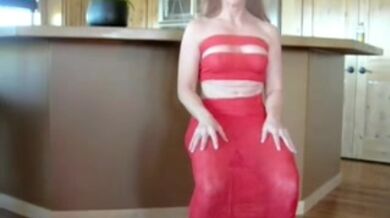 Mature Woman in Red Costume Enjoys Anal Play