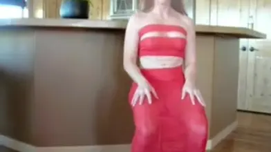 Mature Woman in Red Costume Enjoys Anal Play