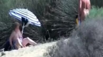 Pervert Granny Masturbates at Beach