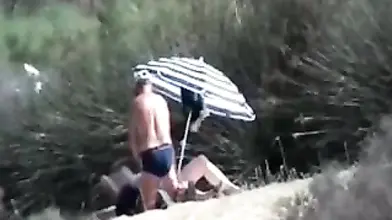 Pervert Granny Masturbates at Beach