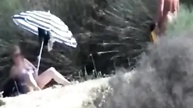 Pervert Granny Masturbates at Beach