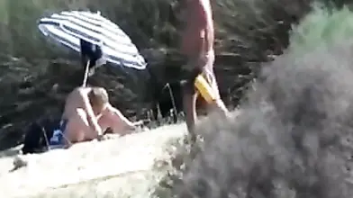 Pervert Granny Masturbates at Beach