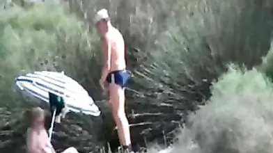 Pervert Granny Masturbates at Beach