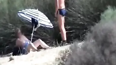 Pervert Granny Masturbates at Beach