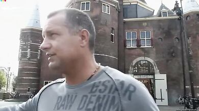 Blonde Seductress Charms Men with Her Assets