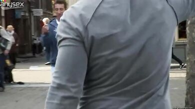 Blonde Seductress Charms Men with Her Assets