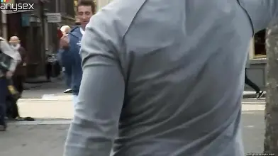 Blonde Seductress Charms Men with Her Assets