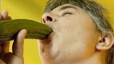 Mature Skank Plays with Cucumber