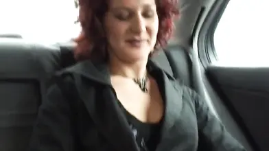 Cheating Redhead MILF Fingers Herself in the Car