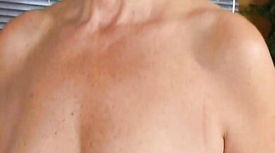 Mature Redhead Plays with Herself