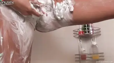 Mature Mom Shaves Her Shaved Pussy