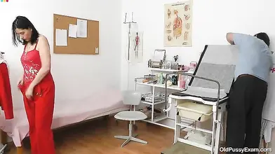 Doctor Examines Pale Cougar's Body