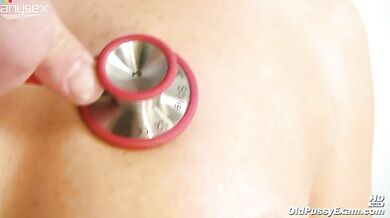 Doctor Examines Mature Brunette Patient