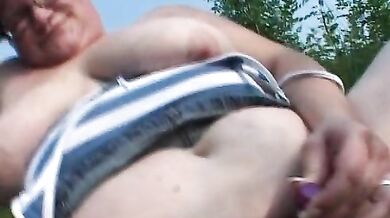 Mature Granny Masturbates Outdoors