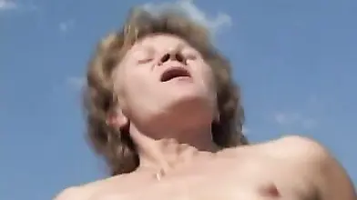 Blonde Mom Rides on the Beach