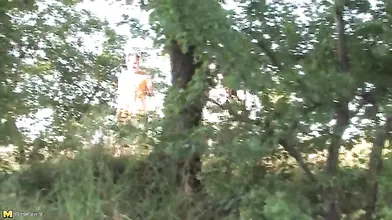 Mature Blonde's Outdoor Threesome