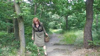 Mature Redhead's Outdoor Cock Ride