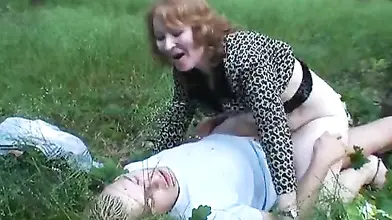 Mature Redhead's Outdoor Cock Ride
