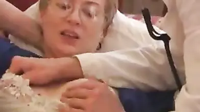 Mature Cougar Seduces Young Stud on Sofa