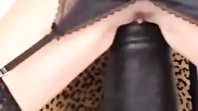 Mature Woman Rides Giant Black Dildo