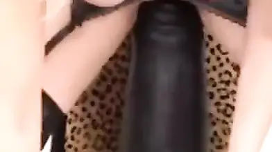 Mature Woman Rides Giant Black Dildo