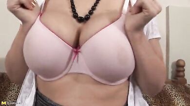 Mature Brunette Plays with Her Body