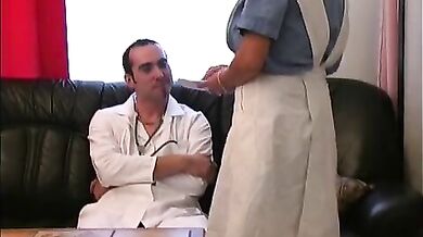 Mature Nurse Examined by Young Doctor