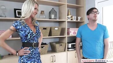 Busty MILF Seduces Nerdy Boy