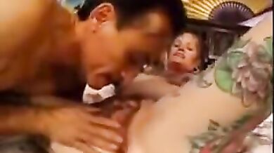 Inked MILF Seduced by Hung Stud