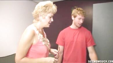 Glasses-Wearing Mommy Sucks Young Stud