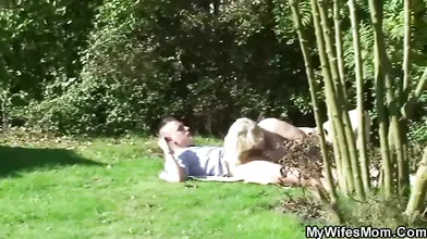 Mature Seductress Lures Young Neighbor