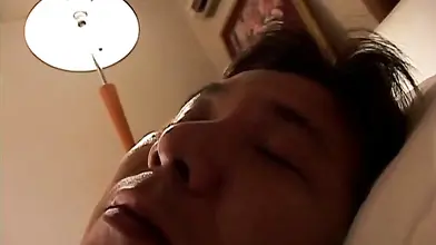 Mature Asian Woman Prepares for Passionate Sex