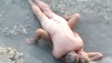 Mature Couple's Beach Encounter