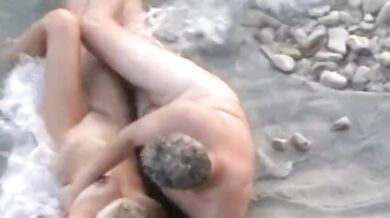 Mature Couple's Beach Encounter