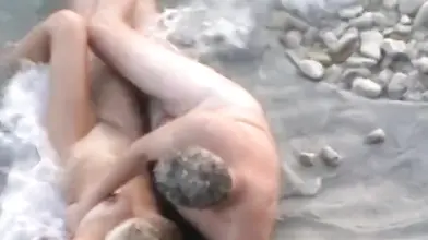 Mature Couple's Beach Encounter