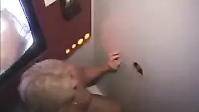 Mature Blonde Enjoys Gloryhole Fun
