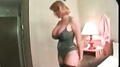 Mature Redhead Sets Her Huge Tits Free