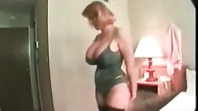 Mature Redhead Sets Her Huge Tits Free