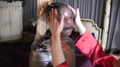 Kinky Teen Mummifies Mature Blonde