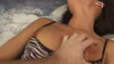 Mature Brunette Plays on the Sofa