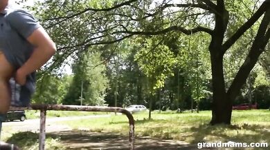 Mature Redhead Sucks in the Woods