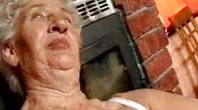 Mature Granny Plays Hard on the Couch