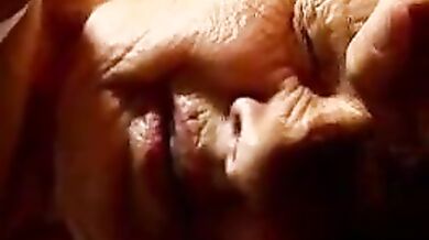 Mature Granny Plays Hard on the Couch