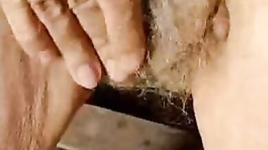 Mature Granny Plays Hard on the Couch