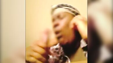 Mature Ebony Skank Gives Phone Blowjob