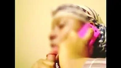 Mature Ebony Skank Gives Phone Blowjob