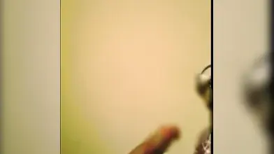 Mature Ebony Skank Gives Phone Blowjob