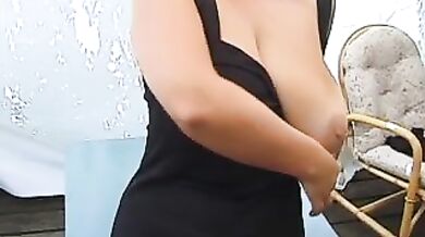 Mature Babe Teases with Her Big Jugs