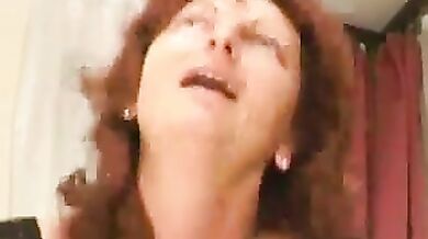 Mature Redhead's Kitchen Table Encounter