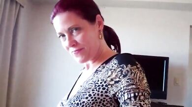 Stunning Redhead MILF Uses Her Feet